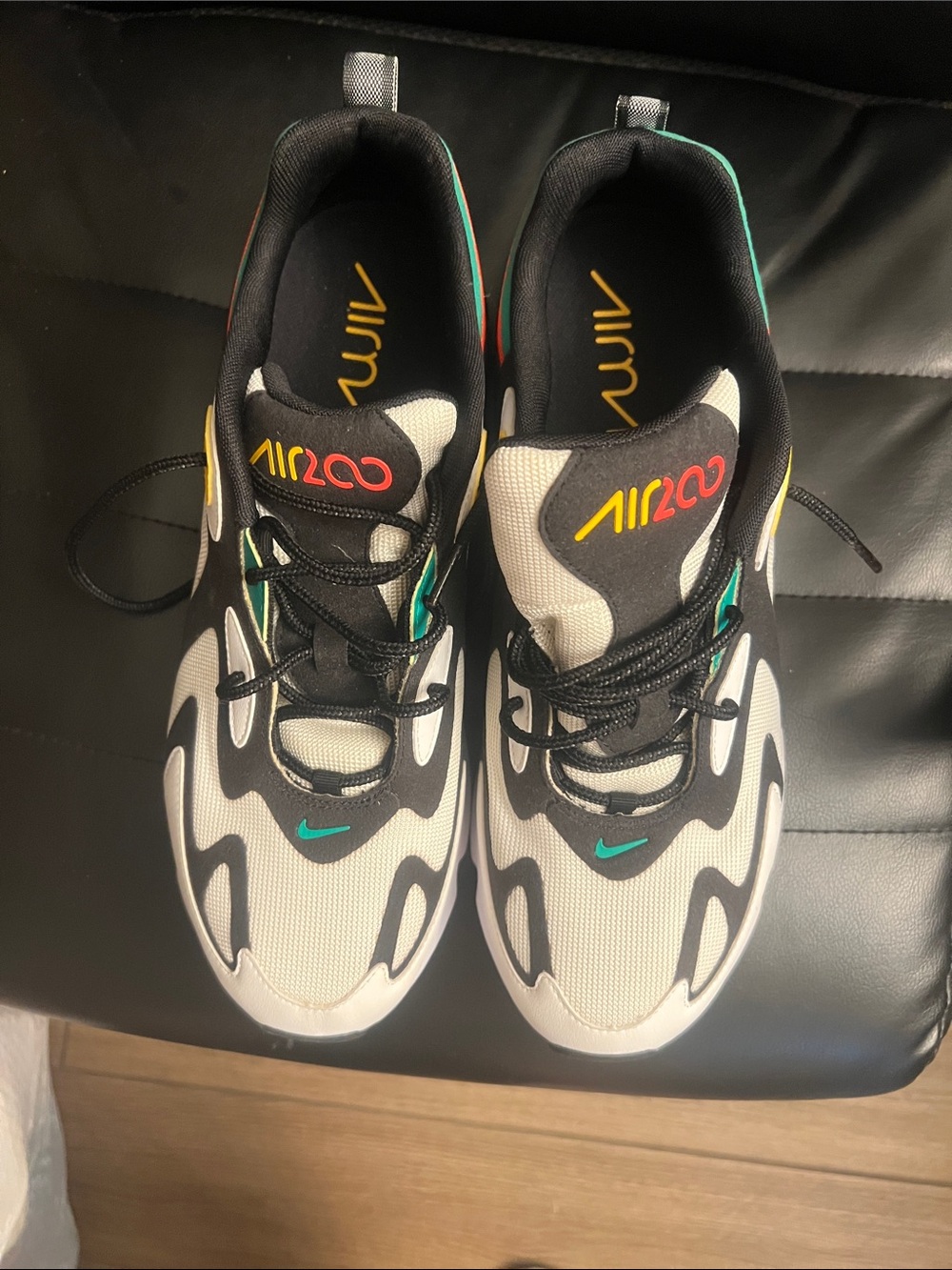 Nike Air200 Sneakers in White, Black, Teal & Yellow
